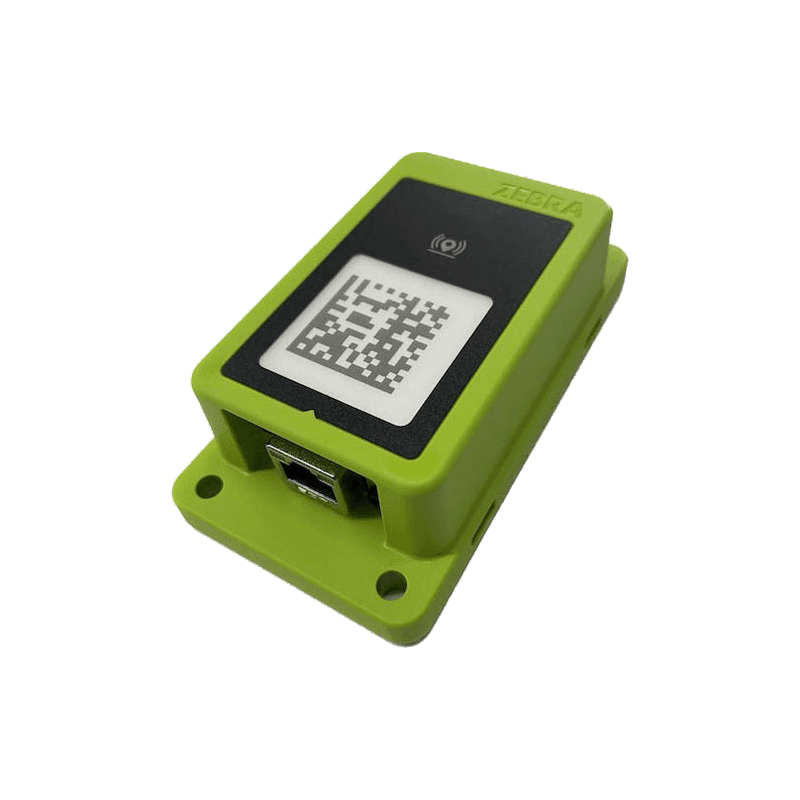 Adapter Bluetooth Zebra BT-RS5X6-DNGL-01 — zielona obudowa z kodem parowania i gniazdem przewodu