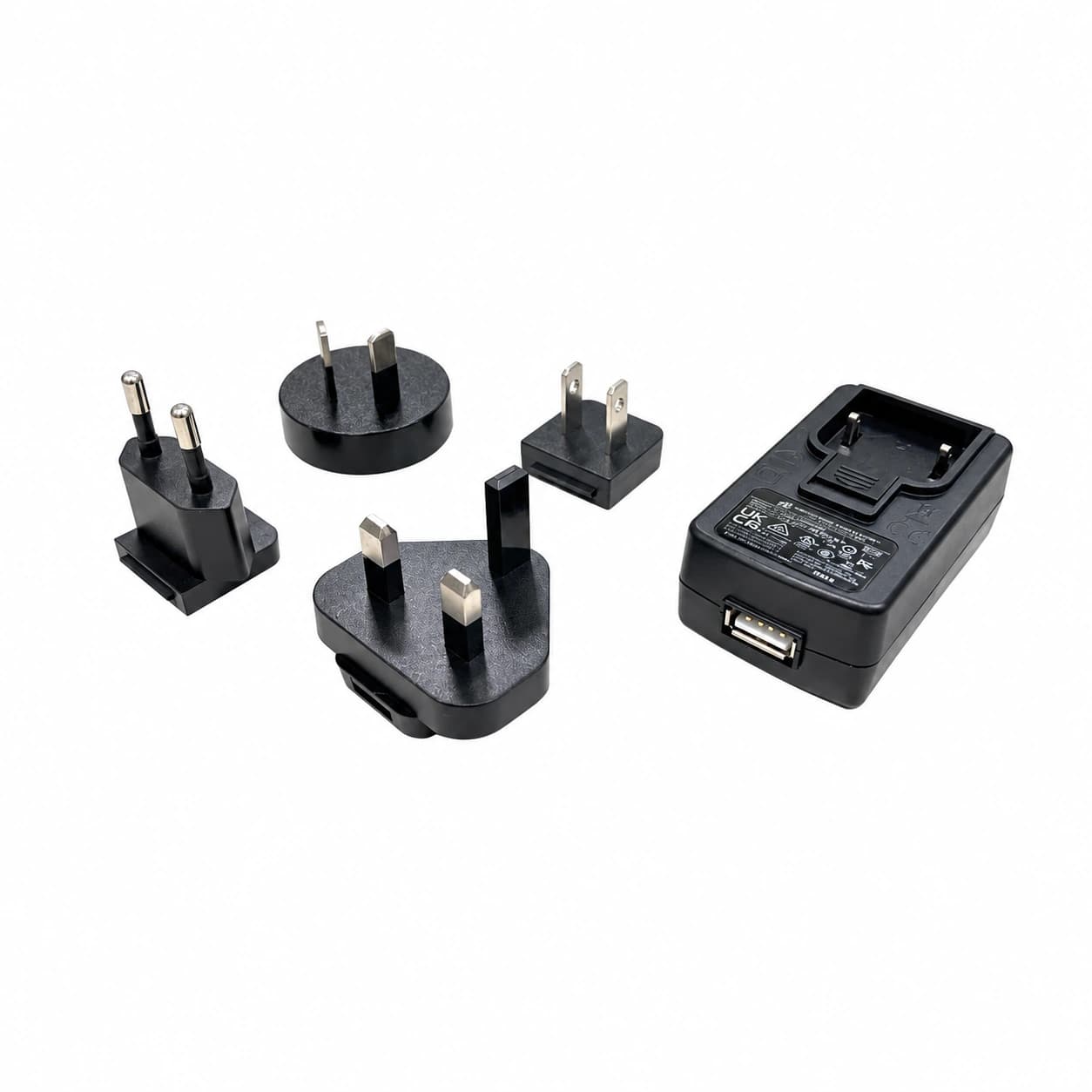 Zasilacz Unitech 1010-900067G 5 V / 2 A — zasilacz z gniazdem USB-A i cztery wymienne wtyczki: EU, UK, US i AU